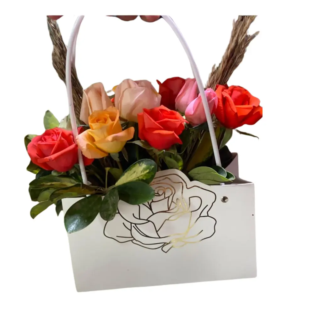 Prestige Rosé Sac floral Prestige Rosé avec roses rouges, roses et pêche dans un sac